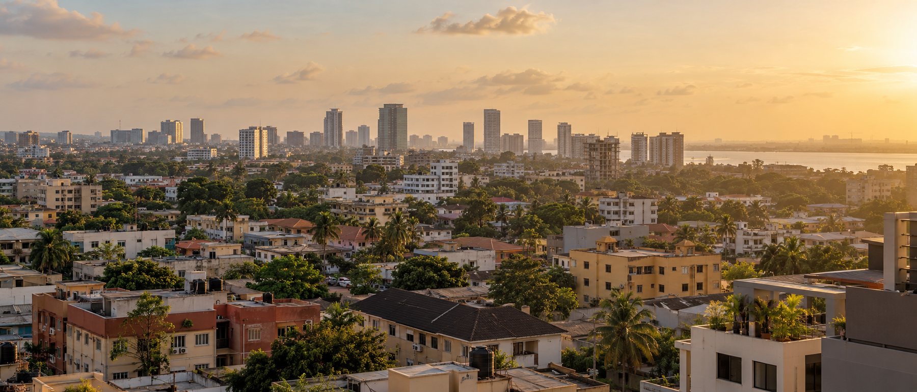 Illustrative panoramic view across a contemporary African city at golden hour